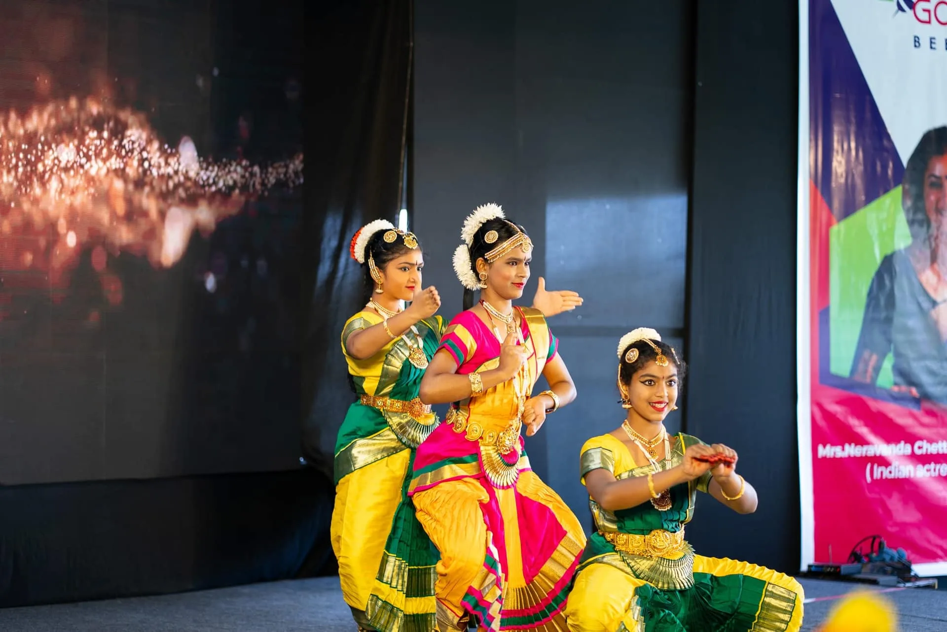 GoldenBee students performing a classical Bharatanatyam dance on stage