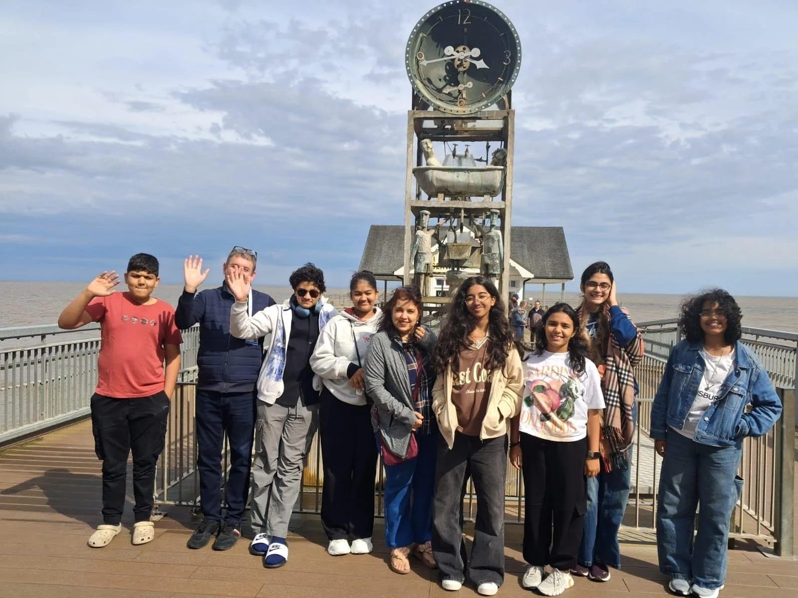 GoldenBee students at the Southwold pier water clock during the UK immersion programme